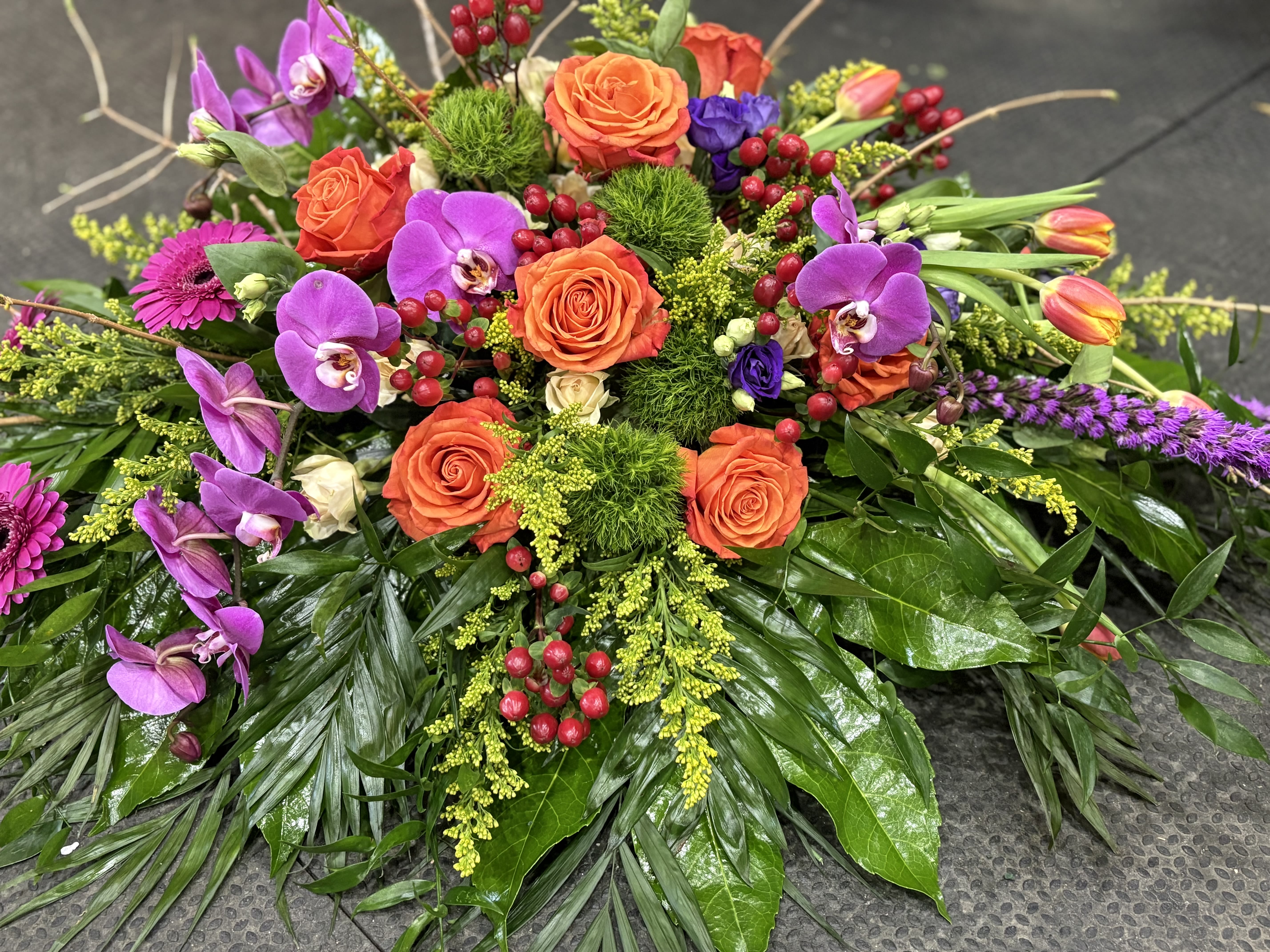 FOND MEMORIES - A brightly colored funeral piece to evoke the fond memories of passed loved ones