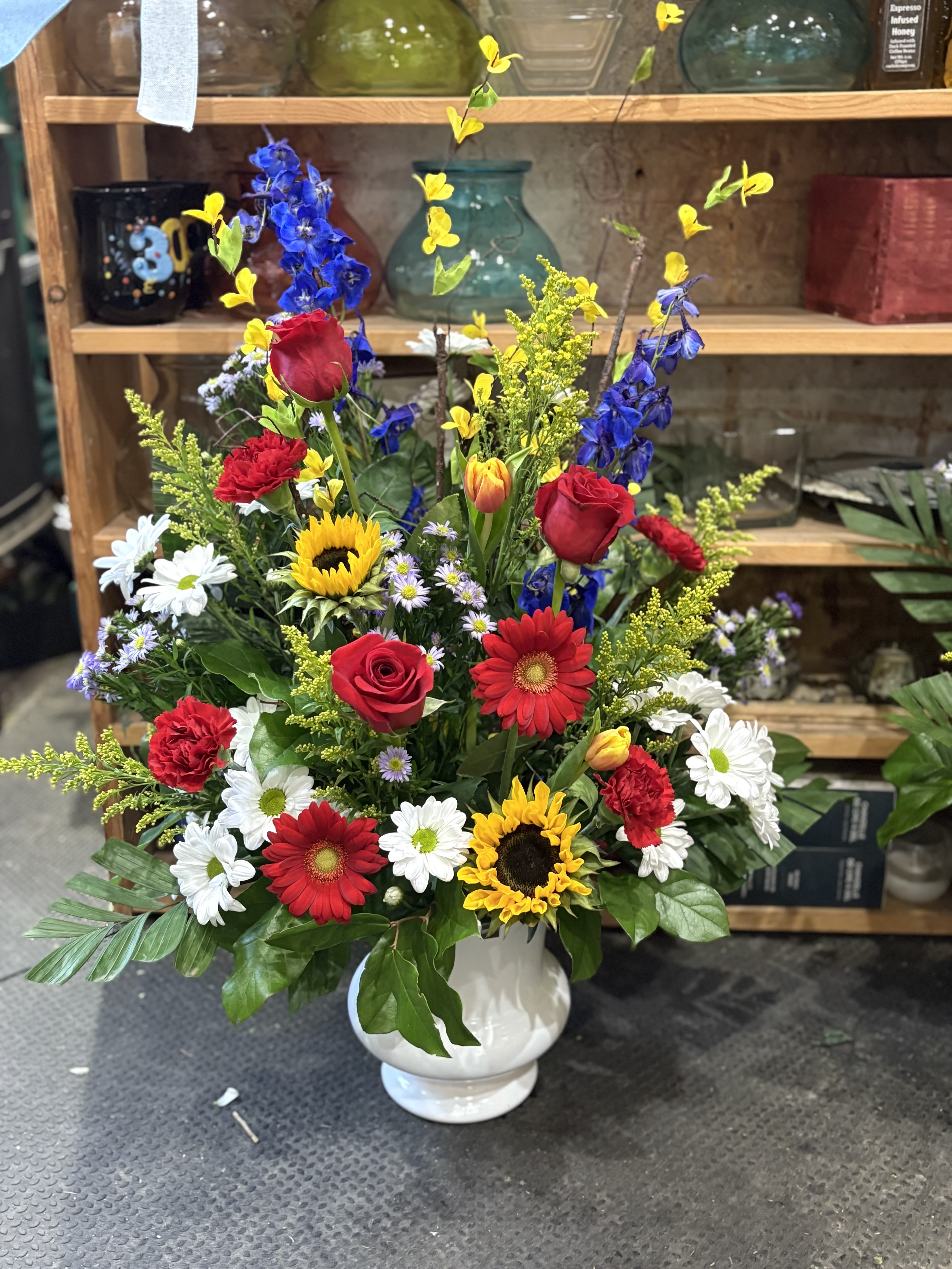 VIVID DREAMS - A stunning funeral piece with vivid colors to remind those of bright memories of passed loved ones