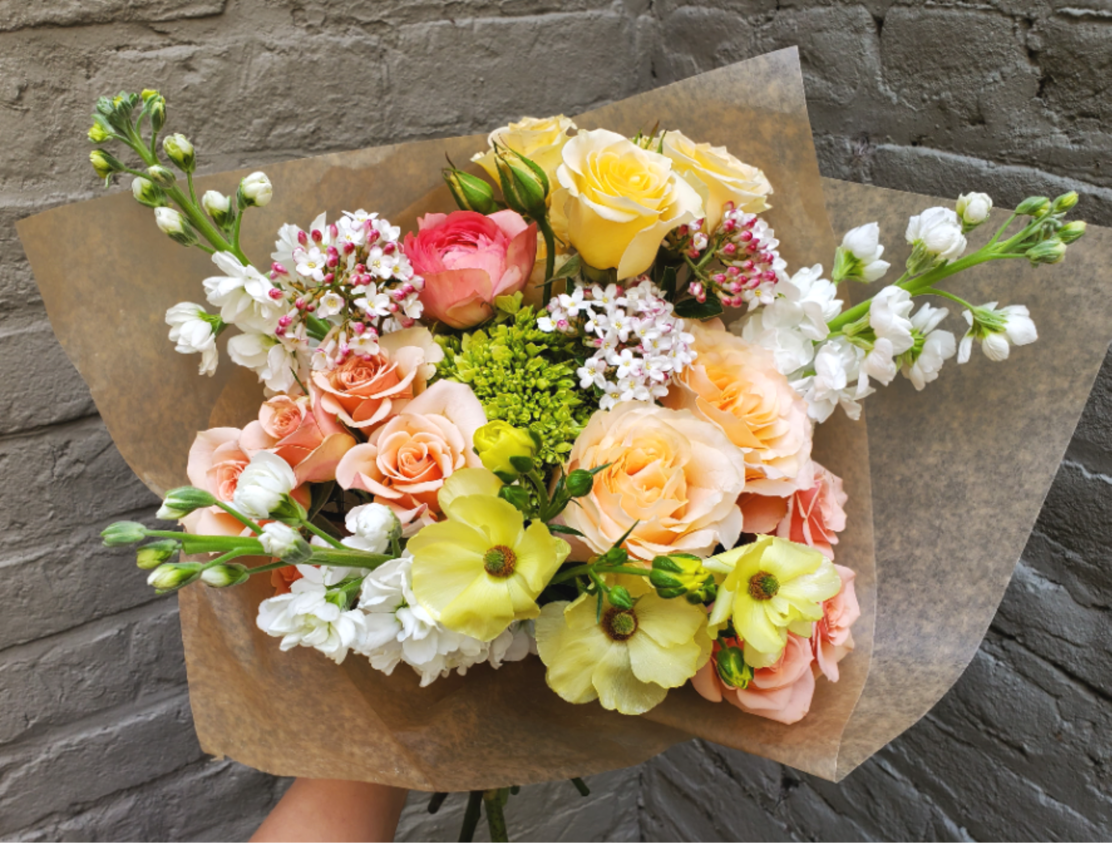 Fresh Hand-wrapped Bouquet - Designer's Choice - Already have a vase waiting to be filled?  Our hand-wrapped bouquets are the perfect answer!  If you have a color preference, simply let us know and our designers will create a beautiful one-of-a-kind wrap for you in the palette of your choice.