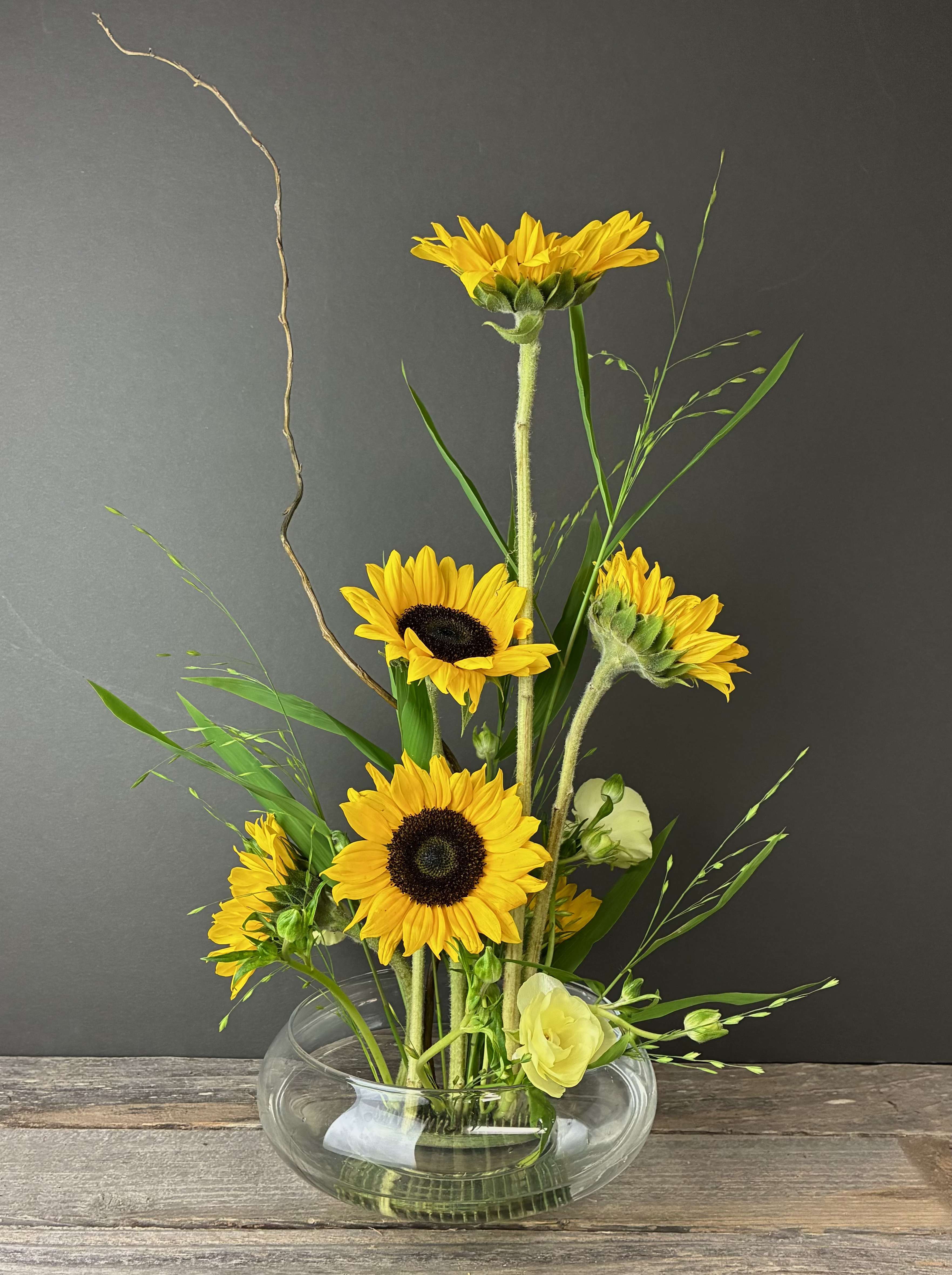Sunflower Serenity - Sometime less is more.. With these striking sunflowers accented by lush grasses, you're transported to warm peaceful summer days.