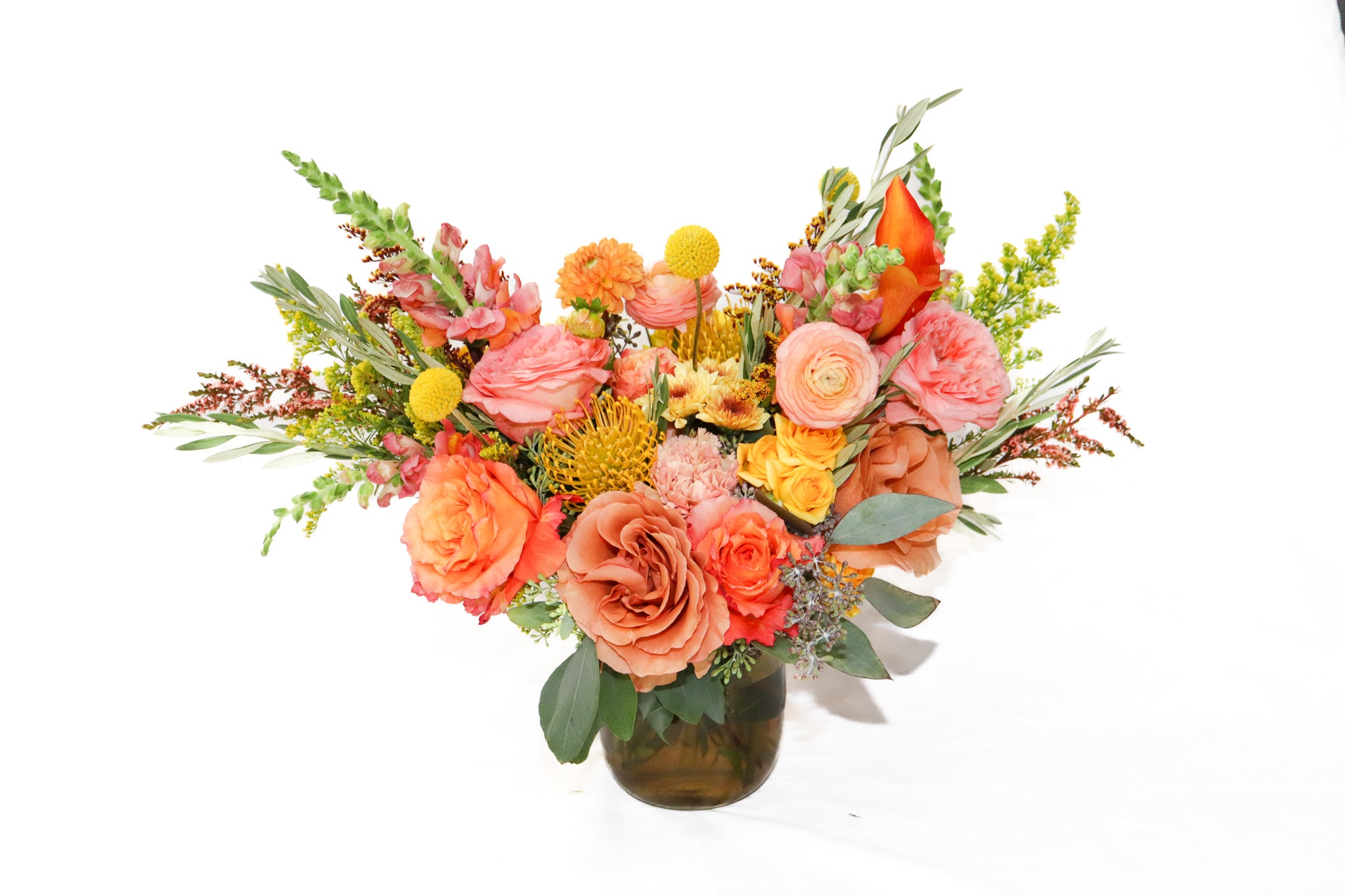 Autumn Walk - Autumn Walk — the latest jewel in our Fall Collection at Le Jardin Rose — is a celebration of color, warmth, and seasonal joy. Handcrafted by our team in New York, this arrangement captures the golden magic of autumn with vibrant florals in shades of amber, burnt orange, russet, and soft gold. Artfully arranged in a sleek glass vase, Autumn Walk is designed to brighten any space — whether it’s a cozy Brooklyn loft, a Manhattan office, or a charming home in Queens.  At Le Jardin Rose, your trusted New York florist, we believe every bouquet should feel both luxurious and personal. That’s why Autumn Walk features only the freshest blooms, selected daily by our floral designers. With our emphasis on quality and artistry, each stem is thoughtfully placed to bring balance, texture, and eye‑catching color contrast — lush foliage, seasonal accents, and bold blooms working together to create a piece that feels alive.  Perfect for birthdays, anniversaries, housewarmings, or “just because,” Autumn Walk brings a burst of fall cheer wherever it goes. And because Le Jardin Rose specializes in flower delivery in New York, NY, you can count on same‑day or next‑day delivery to Manhattan, Brooklyn, and surrounding neighborhoods. Each arrangement is hand‑delivered with care, ensuring your gift arrives fresh, beautiful, and on time.