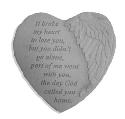 Heart-shaped memorial plaque with angel wings and a sympathy message