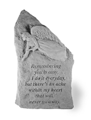Angel memorial stone with an engraved sympathy message