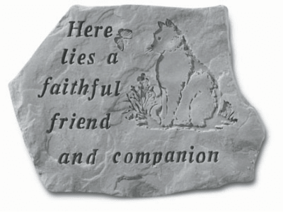 Engraved stone plaque with a cat and the words 'Here lies a faithful friend and companion'