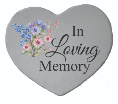 Heart-shaped memorial plaque with floral print and the words In Loving Memory