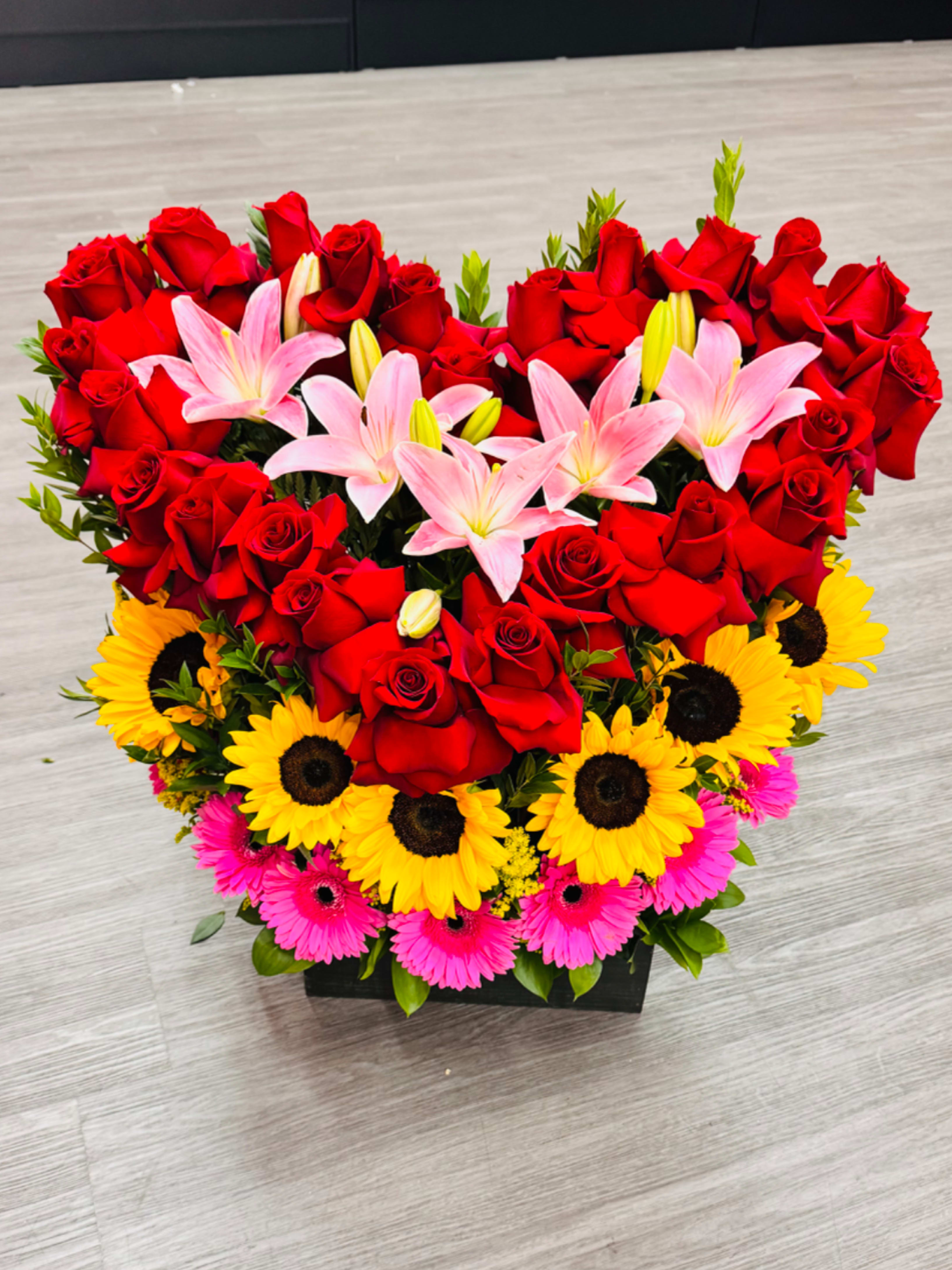 Heart Arrangement - 25 RED ROSES 6-7 Gerberas 6 Sunflowers 5 Lillies stem  NOT A BOUQUET BUT COMES IN Wood BOX (Box will depend on supply)