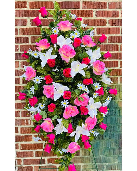 Pink and white floral standing spray with roses and lilies