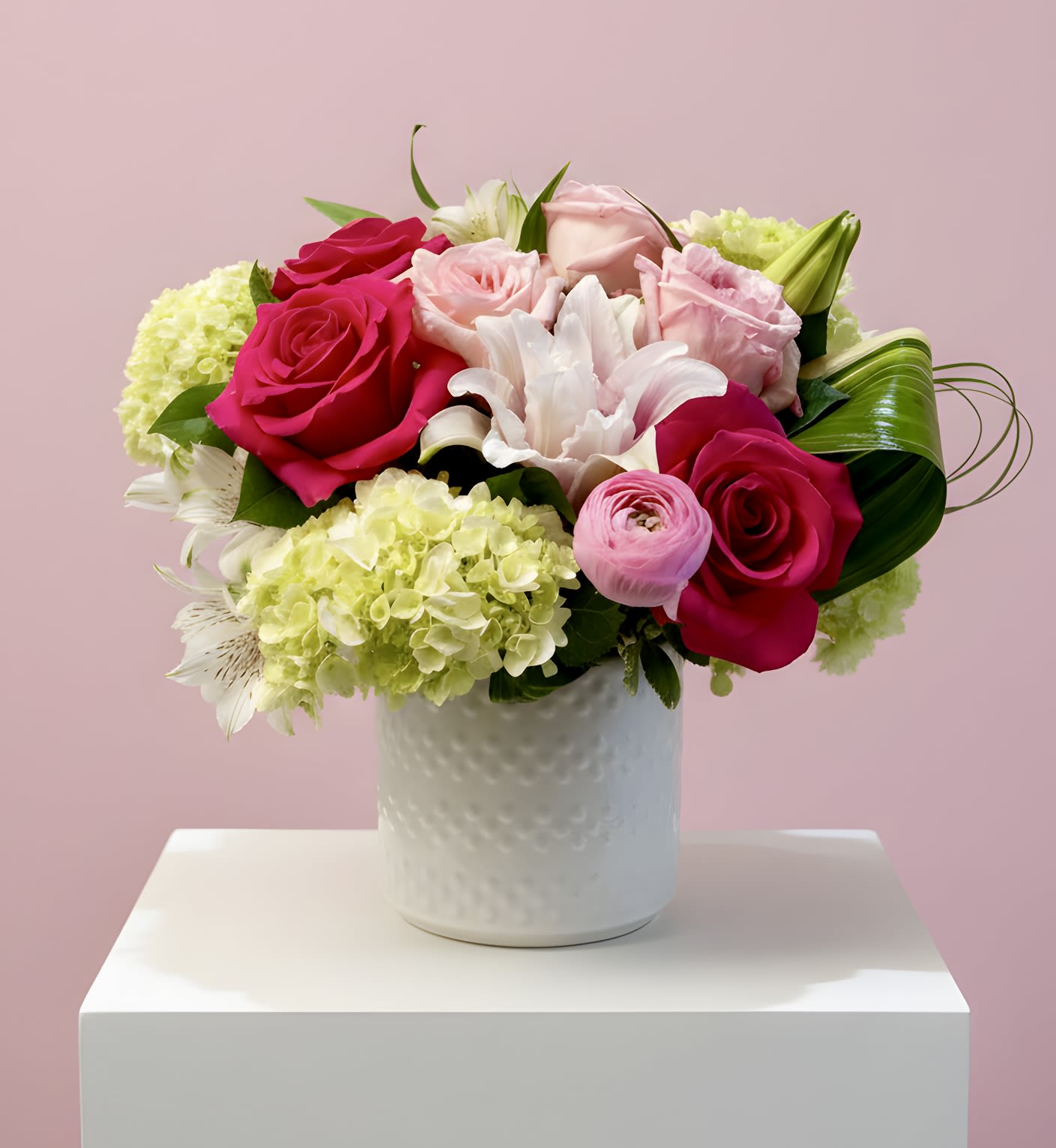 Pretty in Pink  - A curated mix of soft and bold pink blooms, artfully arranged to create a refined, high-design statement.