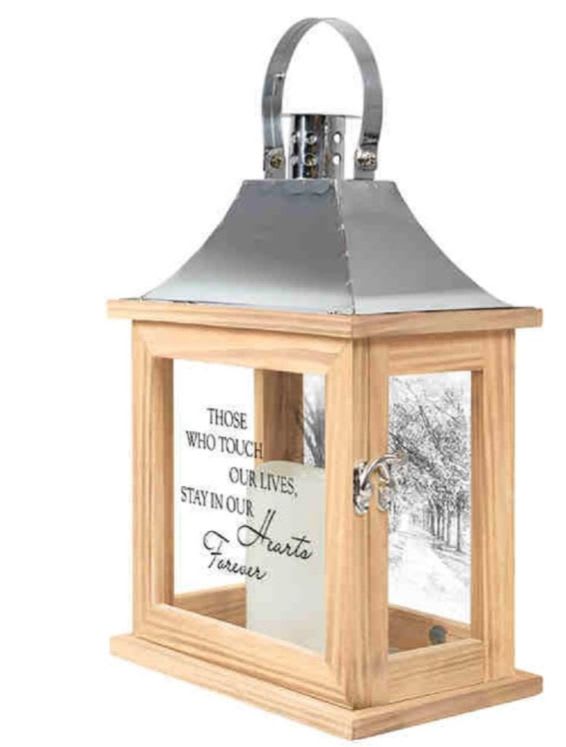 Wooden memorial lantern with a metal top and engraved tribute text