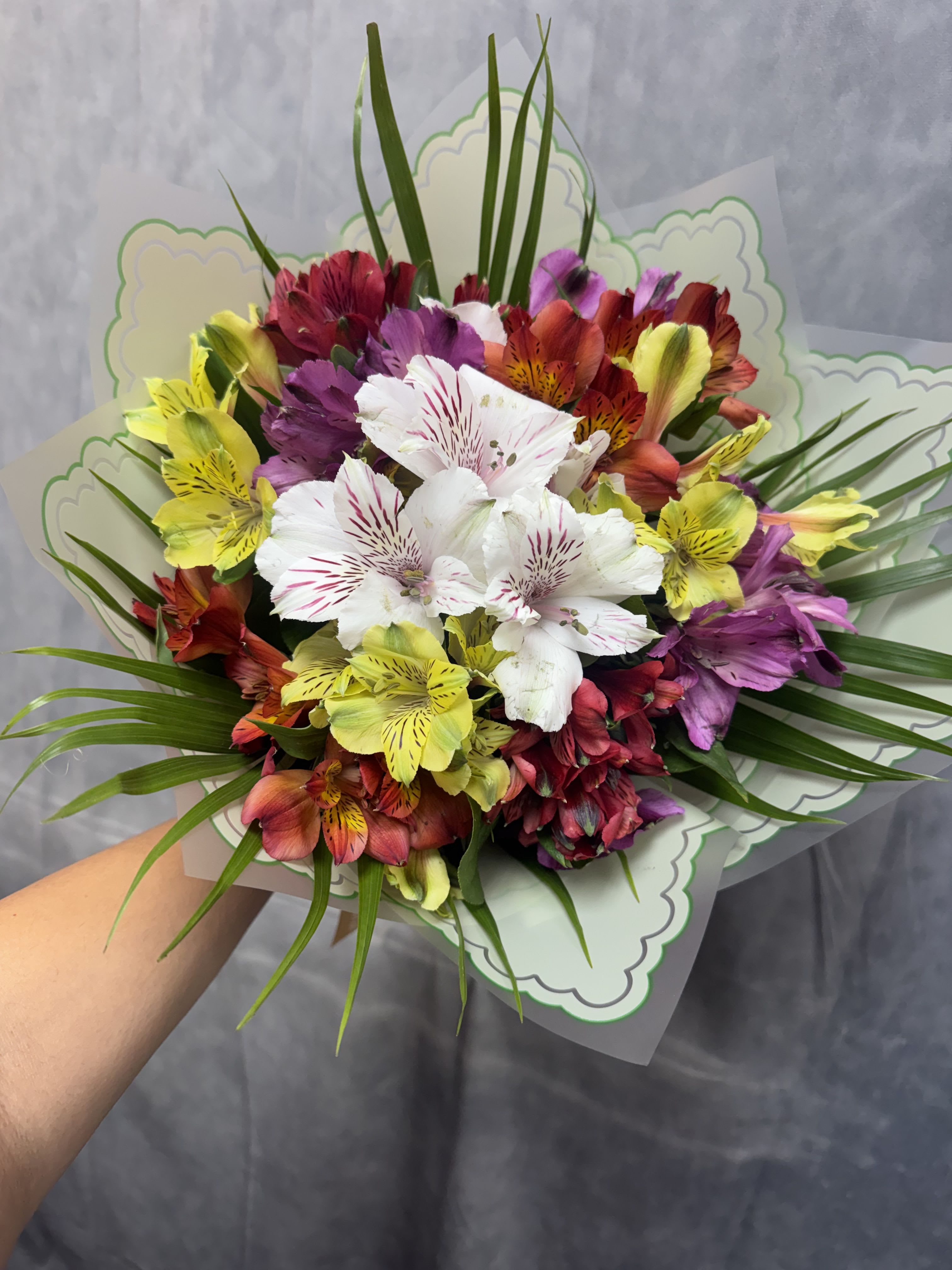 Alstroemerias Lovers Bouquet  - Introduction our alstroemerias lovers bouquet, beautifully arranged with greenery.  Standard size has 10 stems, deluxe size has 20 stems, premium has 30 stems 