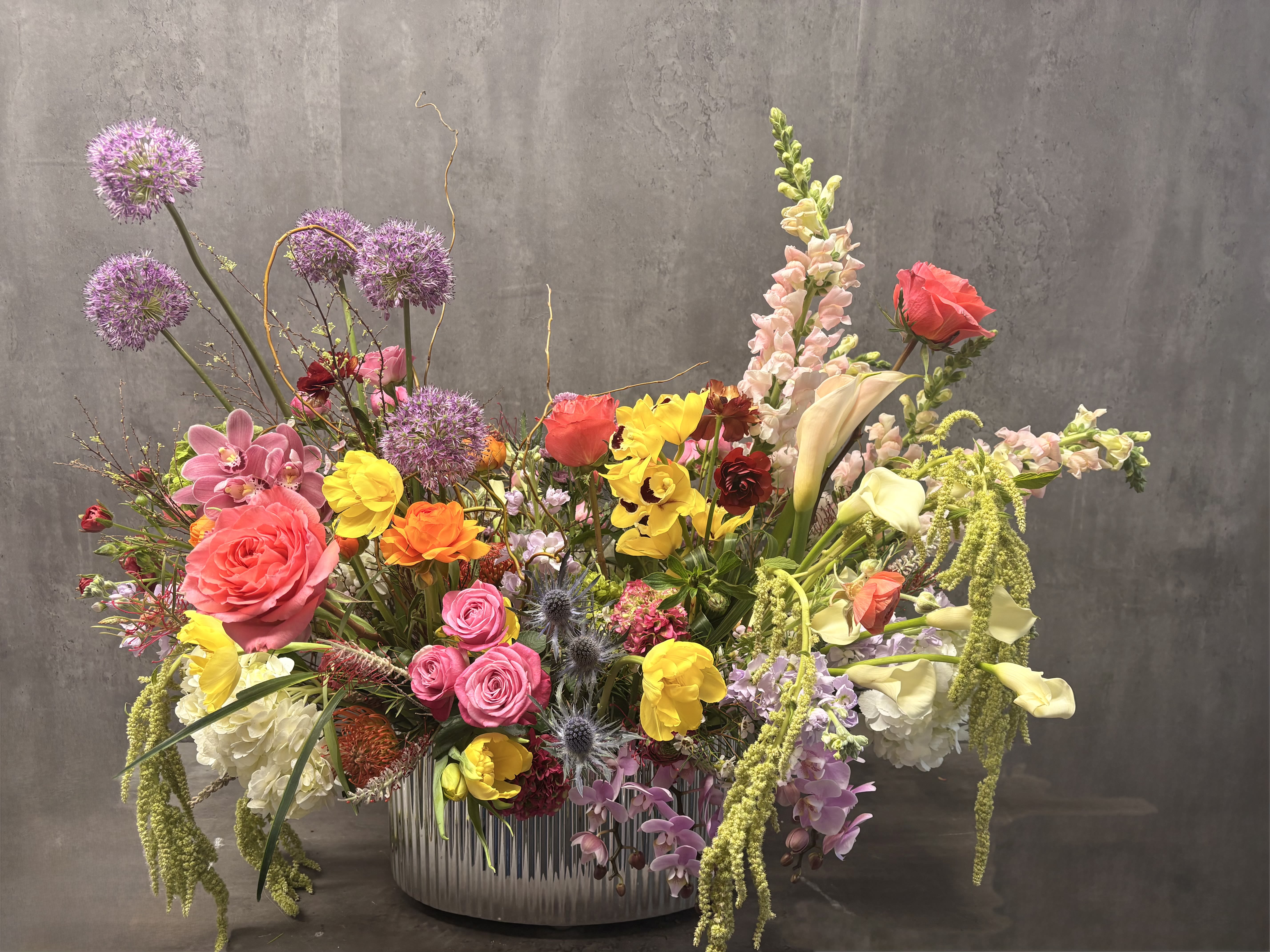 Ethereal Majesty - A very large, extremely impressive arrangement created with a large variety of color and premium flowers. Flower selection will change based of seasonal availability but the overall feel will remain the same. 