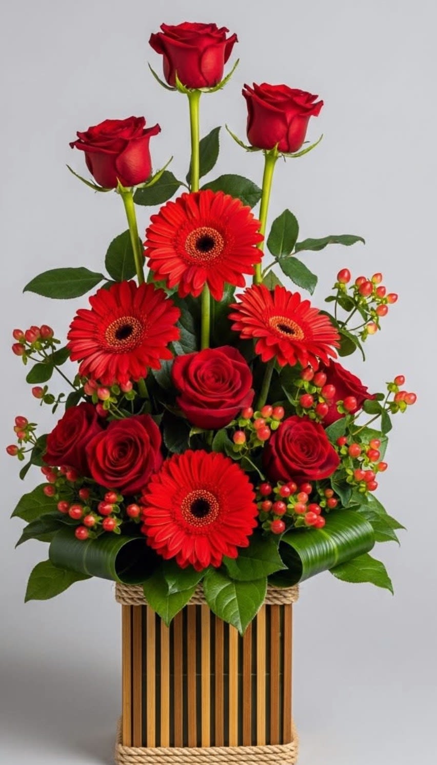 Royal Red Garden - Elegant red flower arrangement by Snyder Flowers in San Antonio featuring fresh red roses, gerbera daisies, hypericum berries and lush greenery with same day flower delivery perfect for Mother’s Day, anniversaries, birthdays and romantic gifts with premium quality flowers at great prices