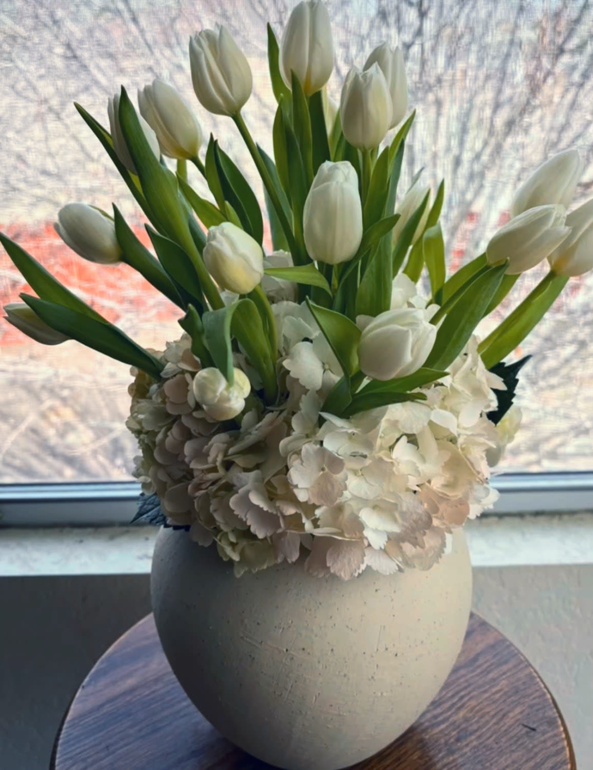 White Tulip &amp; Hydrangea Arrangement – San Antonio - Elegant white flower arrangement by Snyder Flowers in San Antonio featuring fresh white tulips, hydrangeas and premium greenery designed in a modern ceramic vase perfect for Mother’s Day, sympathy flowers, birthdays and special occasions with same day flower delivery in San Antonio, high quality fresh flowers and affordable prices for a clean and sophisticated look