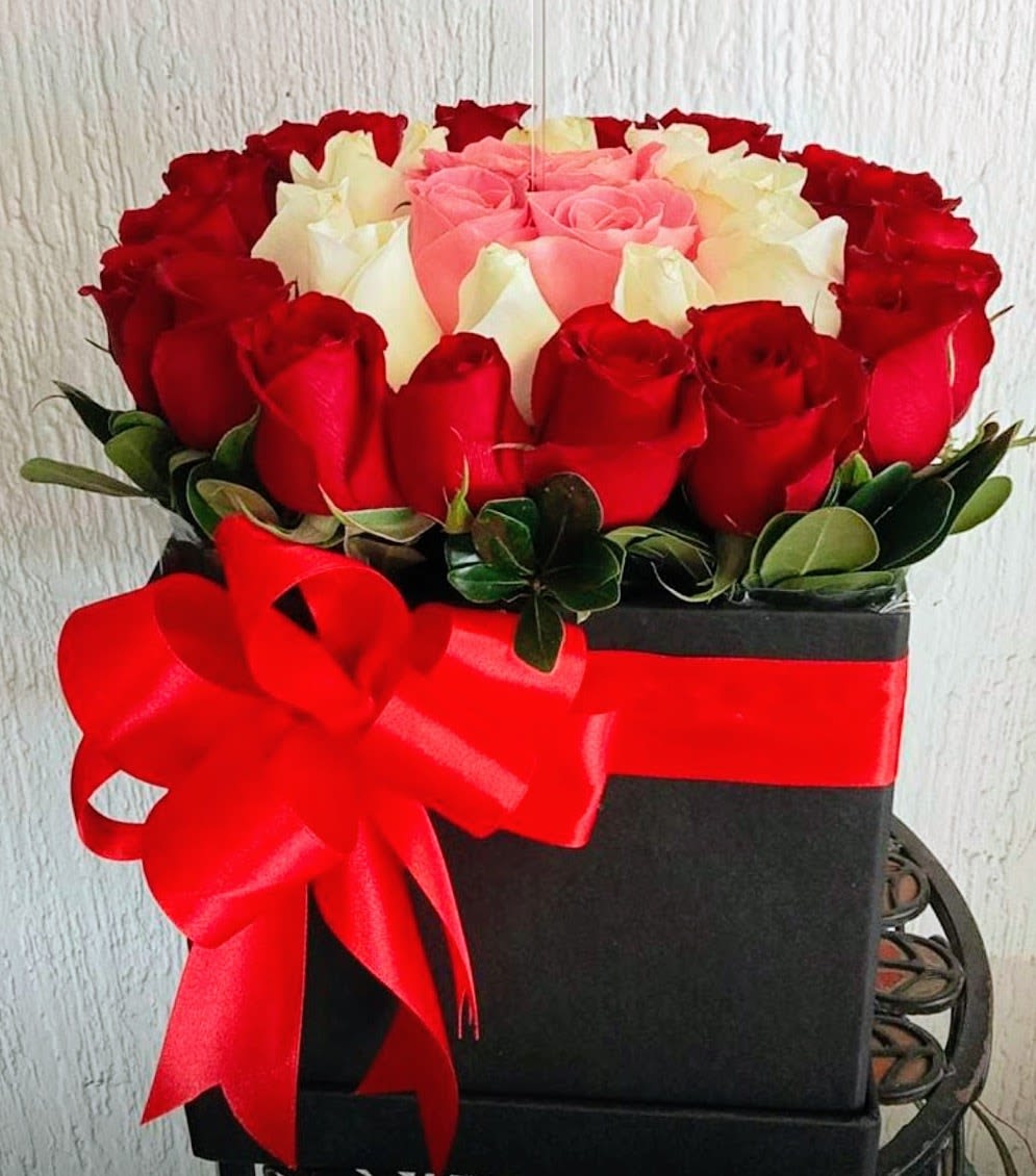 Forever Love Luxury Roses Box - Luxury rose arrangement featuring premium red, white and pink roses elegantly designed in a modern black box. Perfect for anniversaries, Valentine's Day, birthdays, romantic surprises, proposals and special celebrations. Same-day flower delivery available in San Antonio, Stone Oak, Alamo Heights, The Dominion, Helotes, Schertz, Cibolo, Bulverde and surrounding areas.