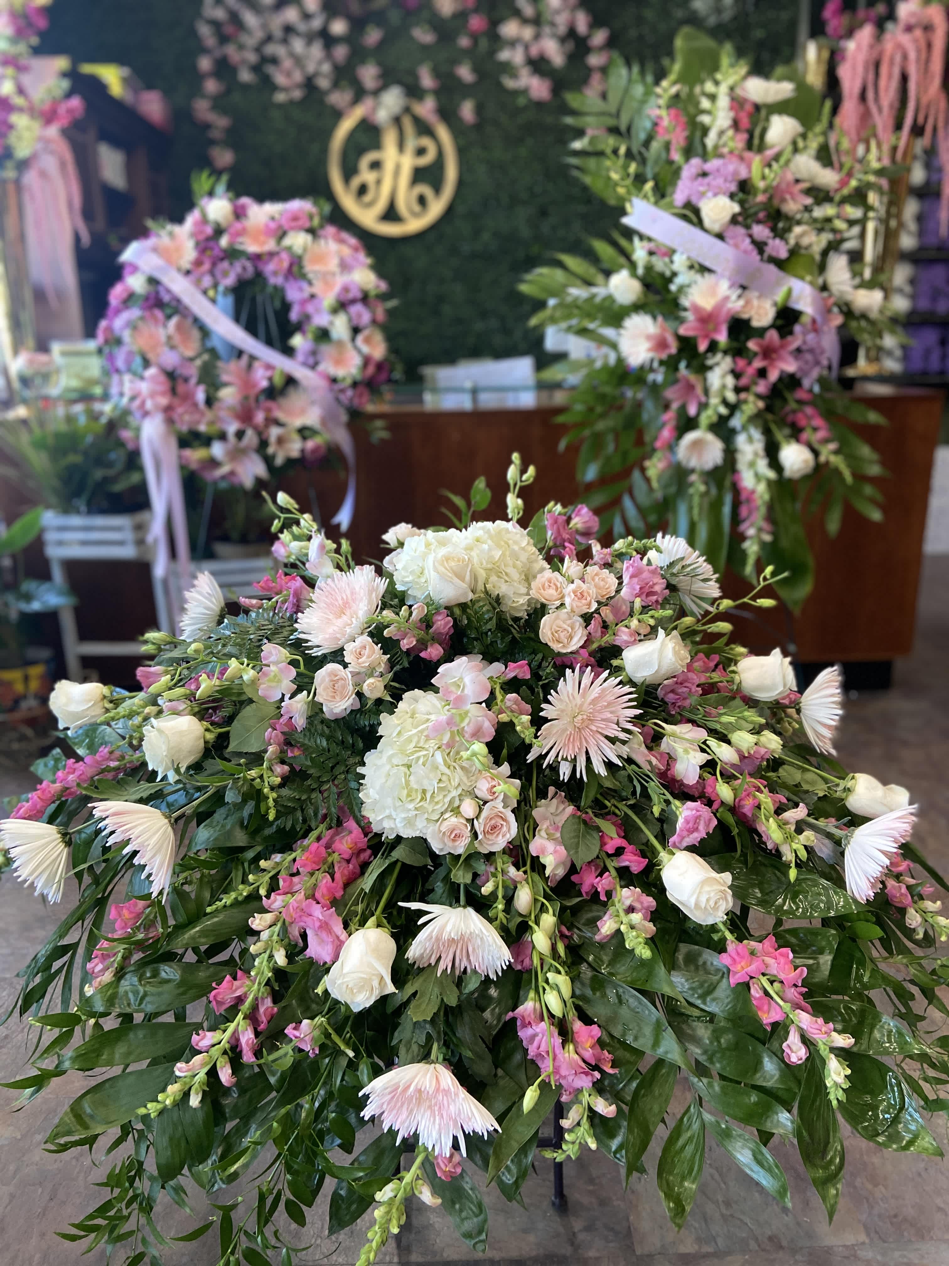 Large pink and white floral spray with roses and hydrangeas