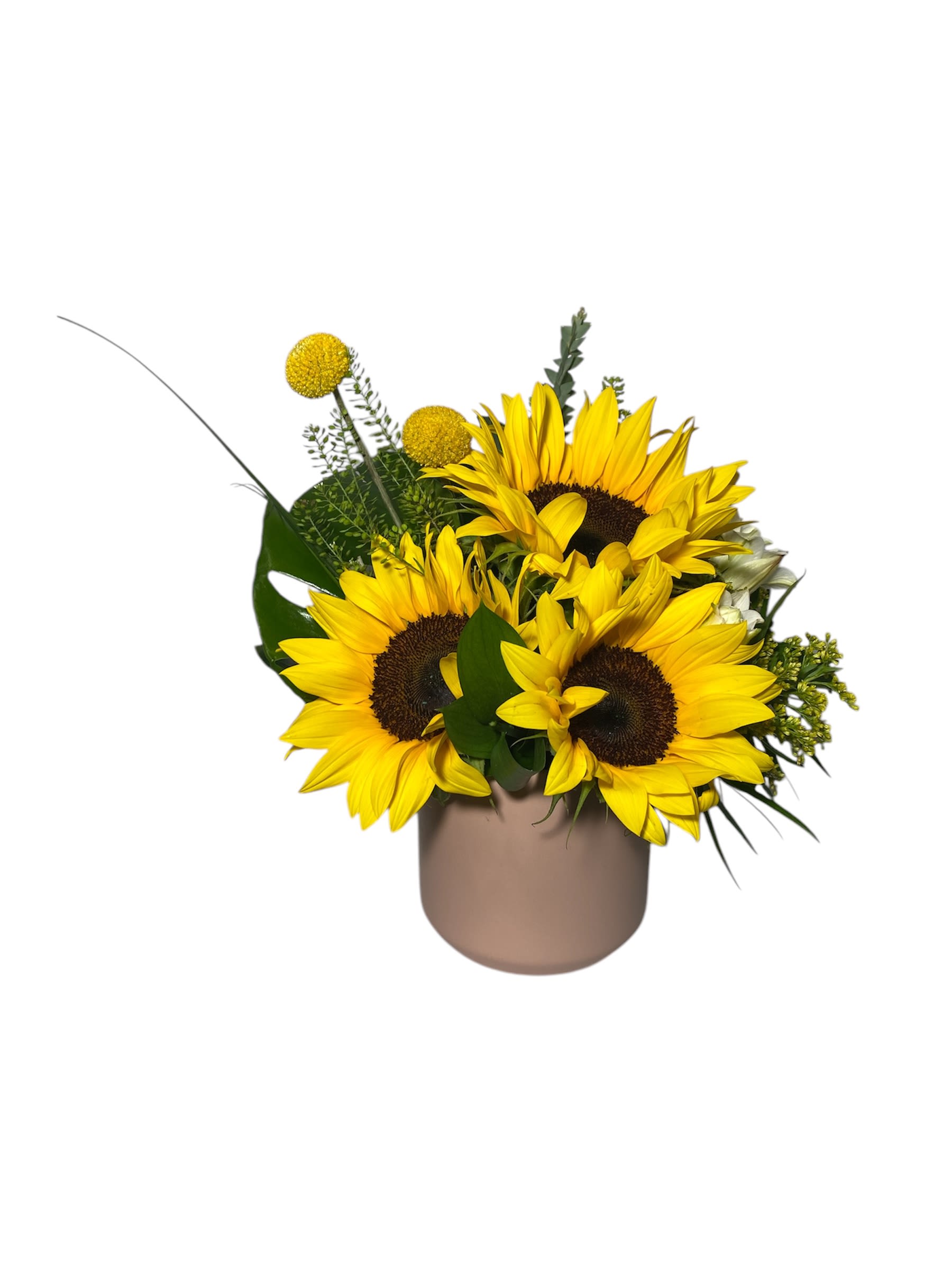 Sunflower arrangement in a beige vase with yellow accent blooms