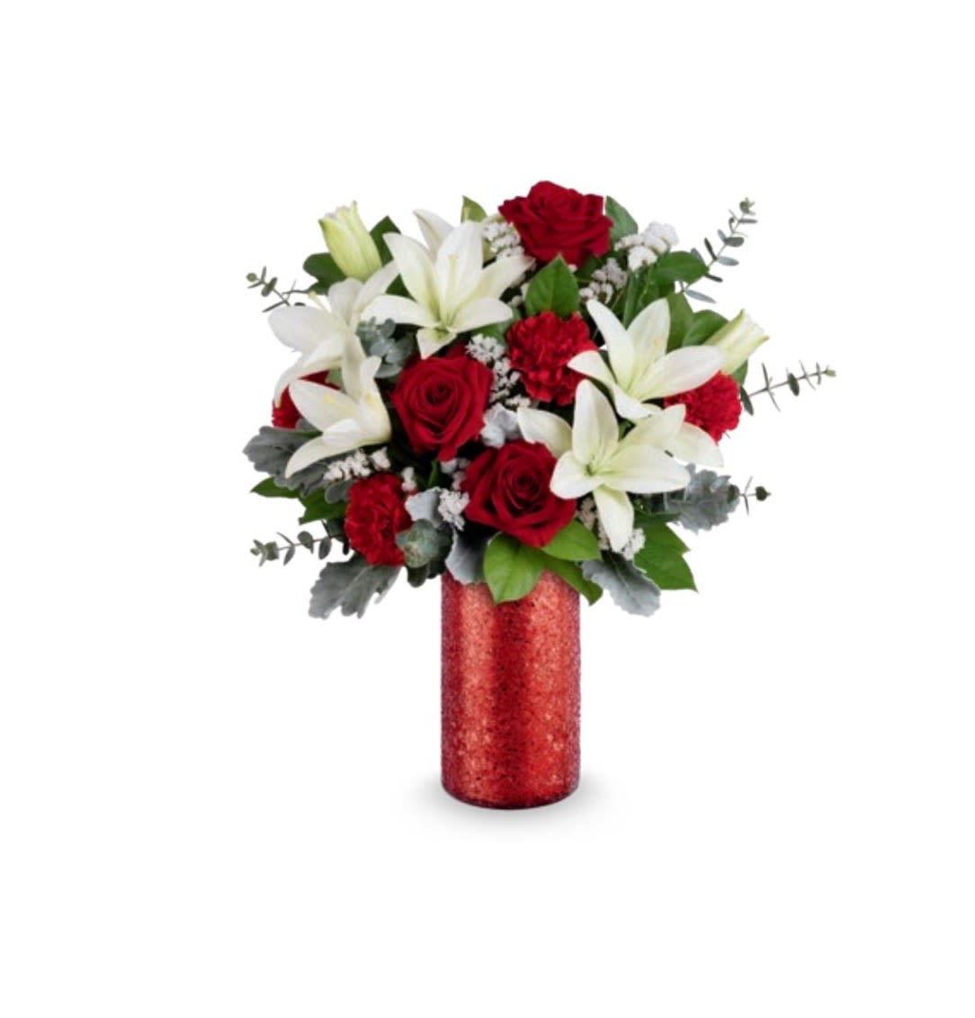 Red roses and white lilies in a red vase