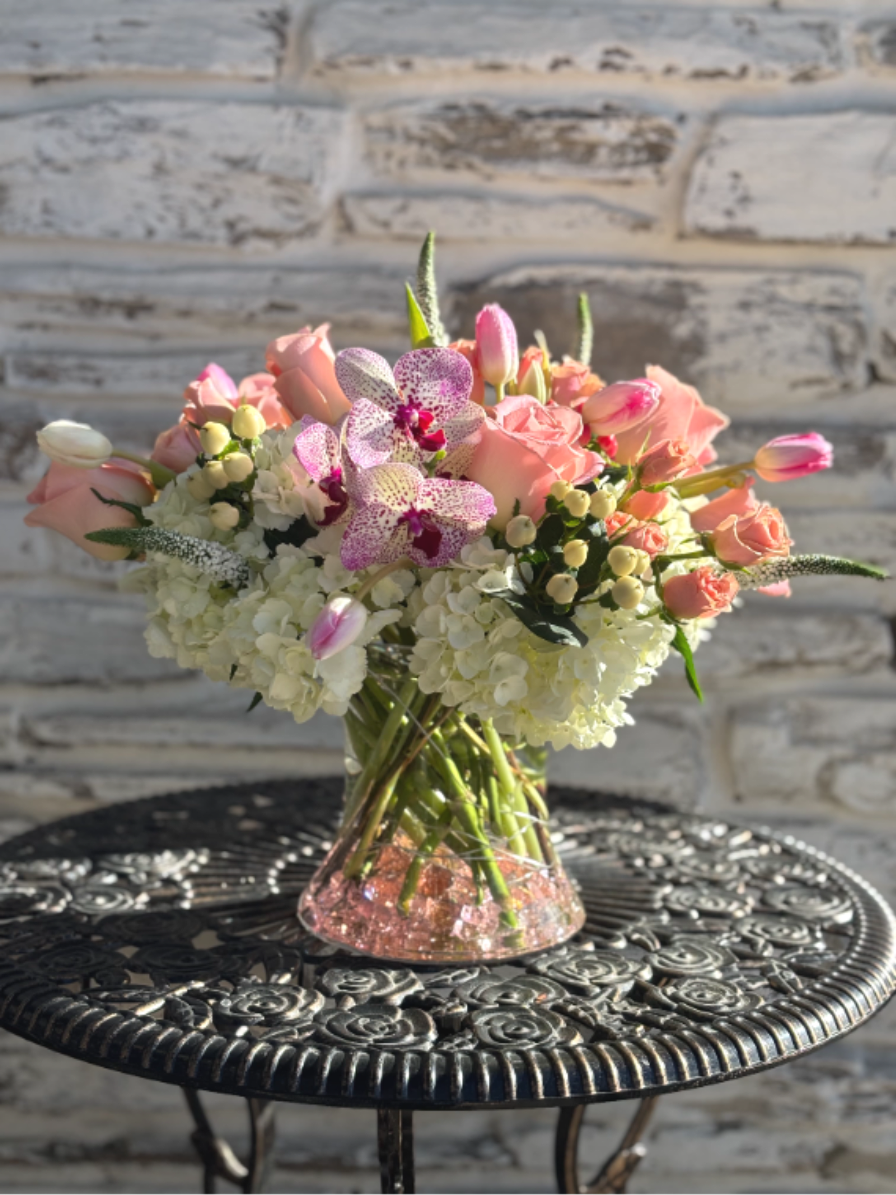 Pink Heaven  - Send a beautiful and lush bouquet of Pink Heaven. Containing soft pink roses, tulips, lush orchids and fluffy hydrangeas.