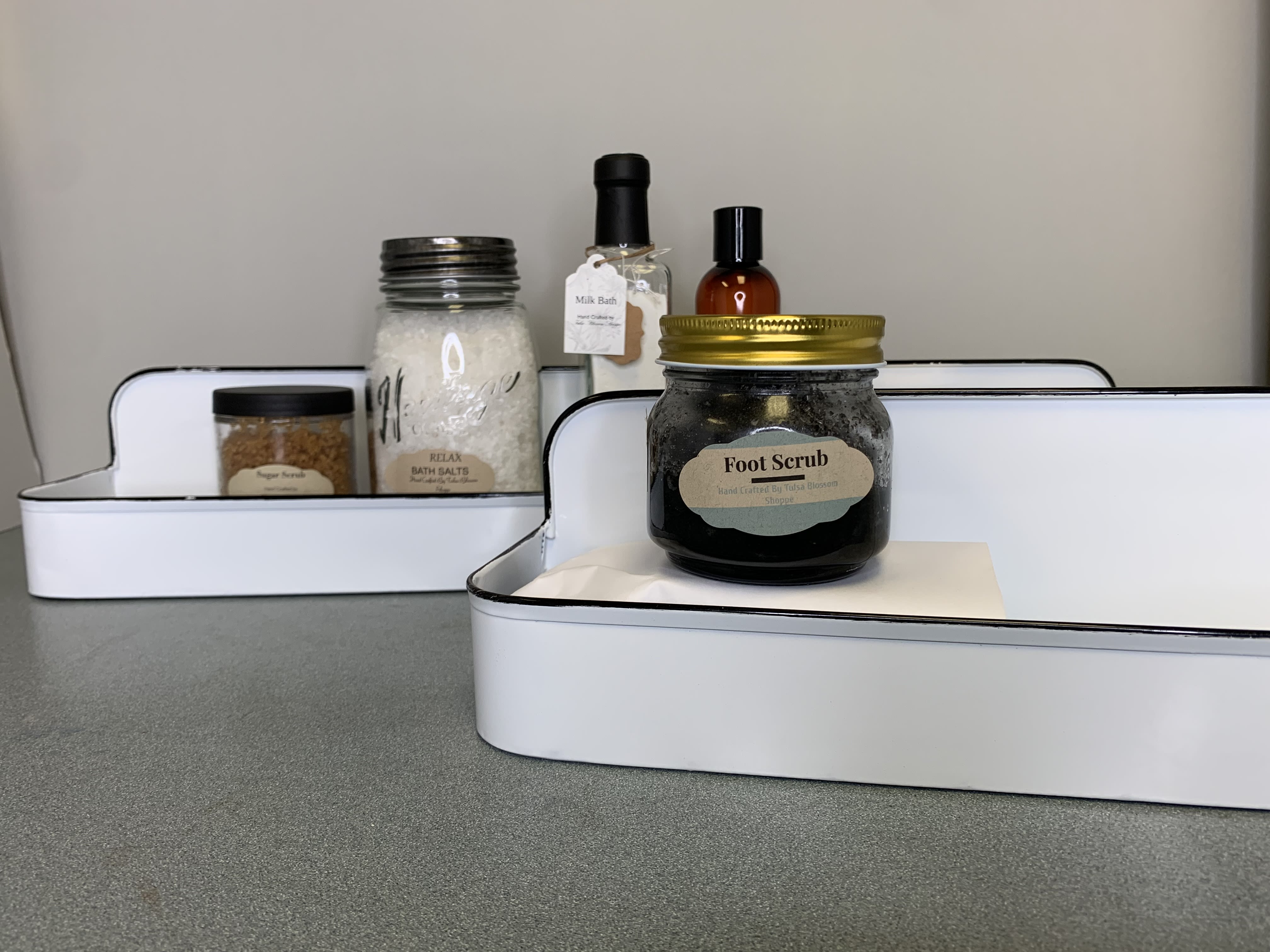 Gift trays with bath and body products in jars and bottles