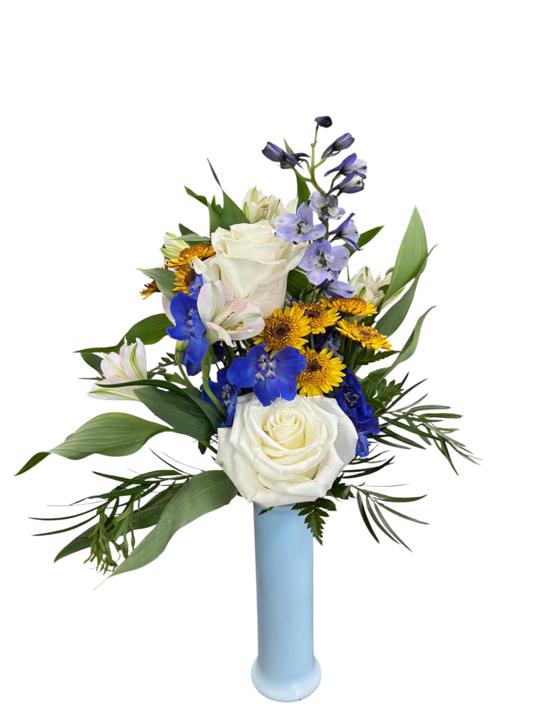 White roses and blue flowers arranged in a tall light blue vase