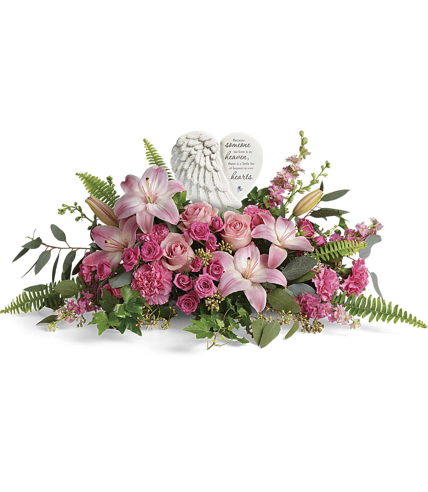 Heartfelt Farewell Bouquet - A heartfelt celebration of a truly special life, this magnificent bouquet of pink roses and lilies beautifully surrounds a touching porcelain keepsake they'll treasure forever.