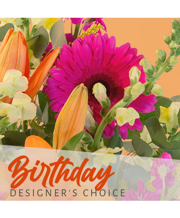 Bright mixed bouquet with a pink gerbera daisy and orange lilies