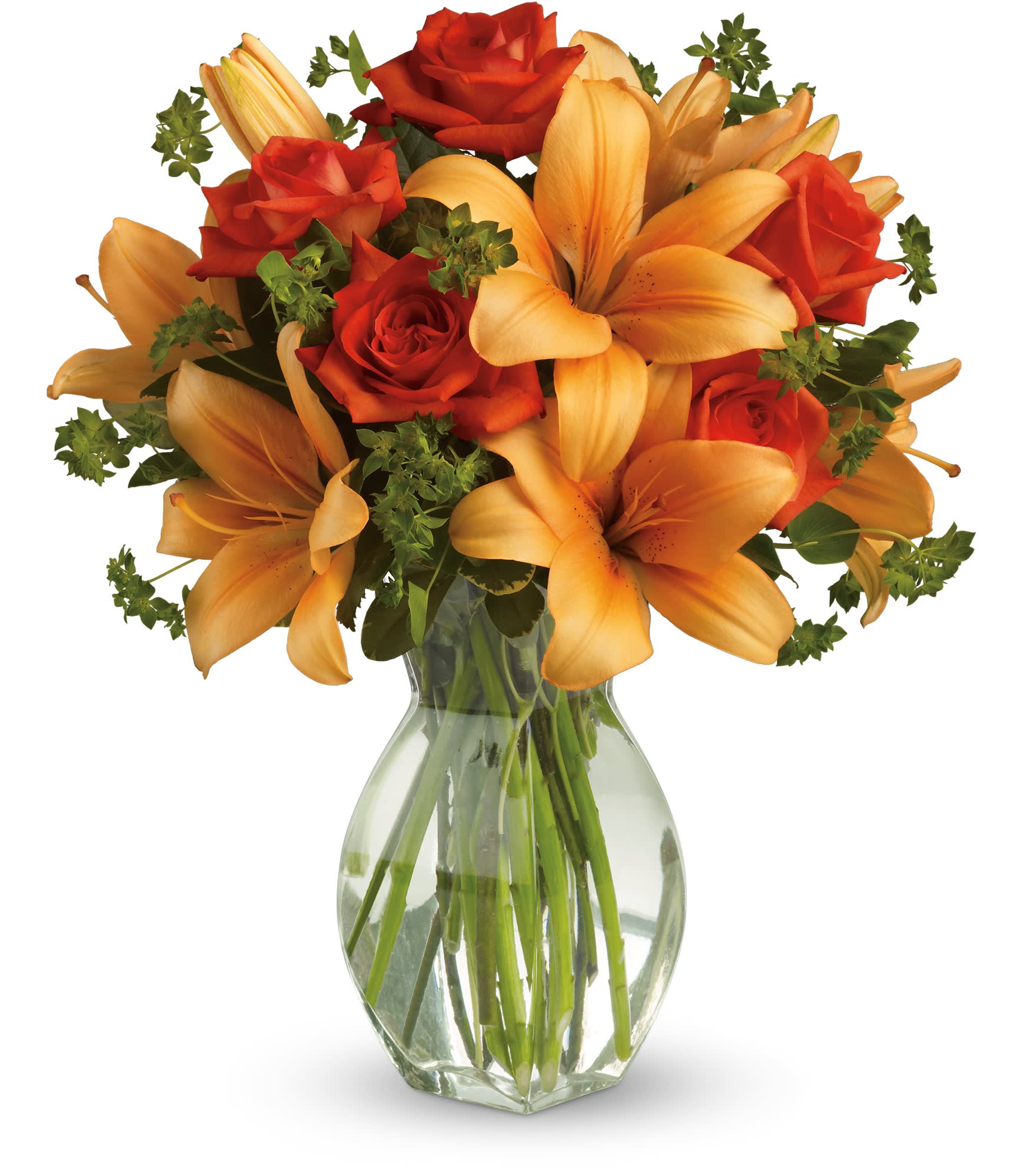 Bouquet of orange lilies and red roses in a clear glass vase