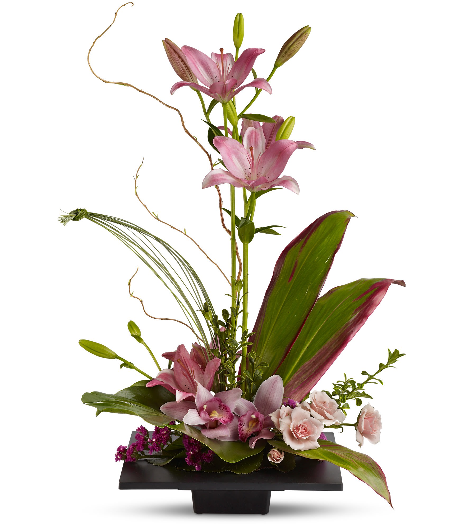 Tall floral arrangement with pink lilies and orchids in a black vase