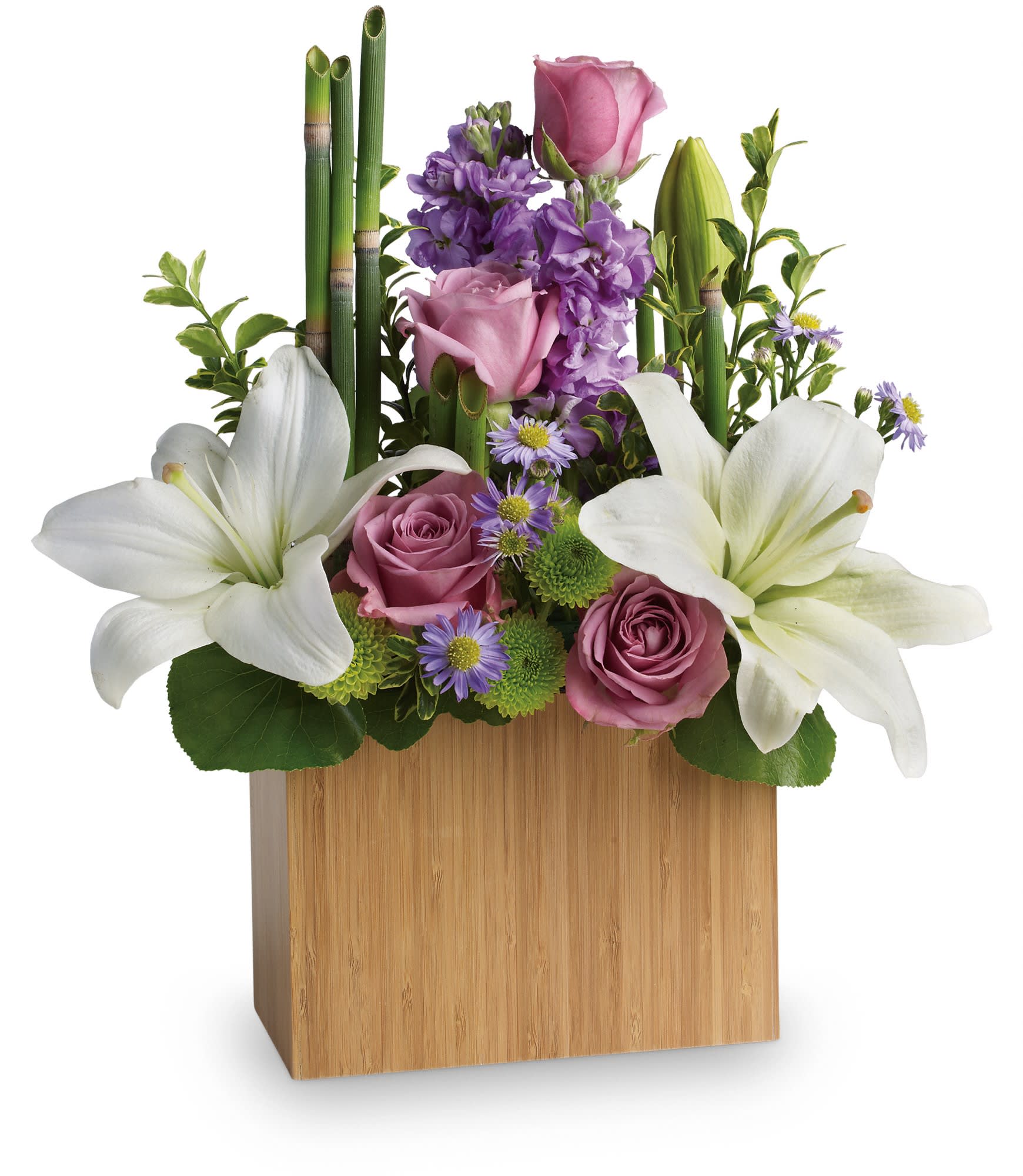 Pink roses and white lilies arranged in a wooden box with purple flowers