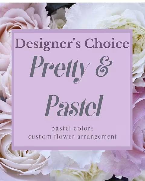 Pastel roses and white flowers behind a pink sign reading Designer's Choice Pretty &amp; Pastel