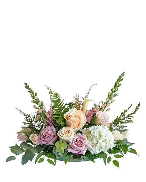 Pastel rose and hydrangea arrangement with fern accents