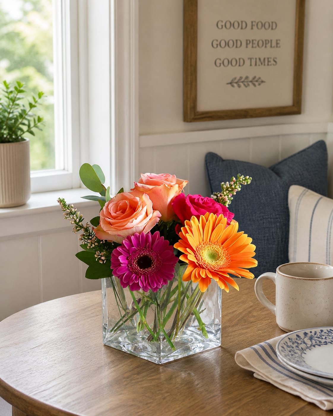 Sunshine Melody - Celebrate life's little moments with this vibrant mix of roses and gerbera daisies, designed to bring smiles and sunshine to any space