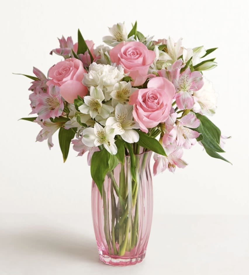 Simply Elegant  - The perfect amount of alstromeria paired with roses to give a kiss of elegance in the room. 