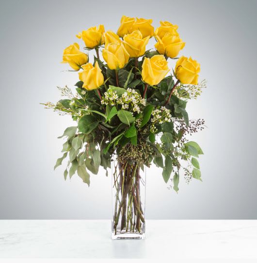 Felicitations by BloomNation™ - Yellow roses are a great option to send a non-romantic love. Send a dozen yellow roses to your friend or family member to brighten up their space and celebrate them! Yellow roses are a good gift for graduations, birthdays, or celebrating an accomplishment like a new job.  Approximate Dimensions: 18"D x 25"H