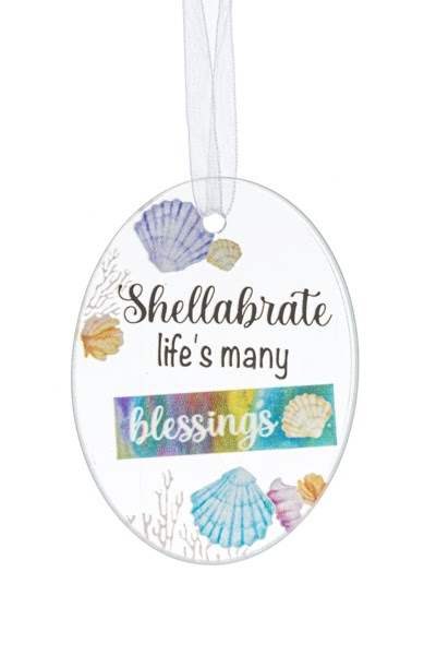 Oval shell ornament with the words "Shellabrate life's many blessings"