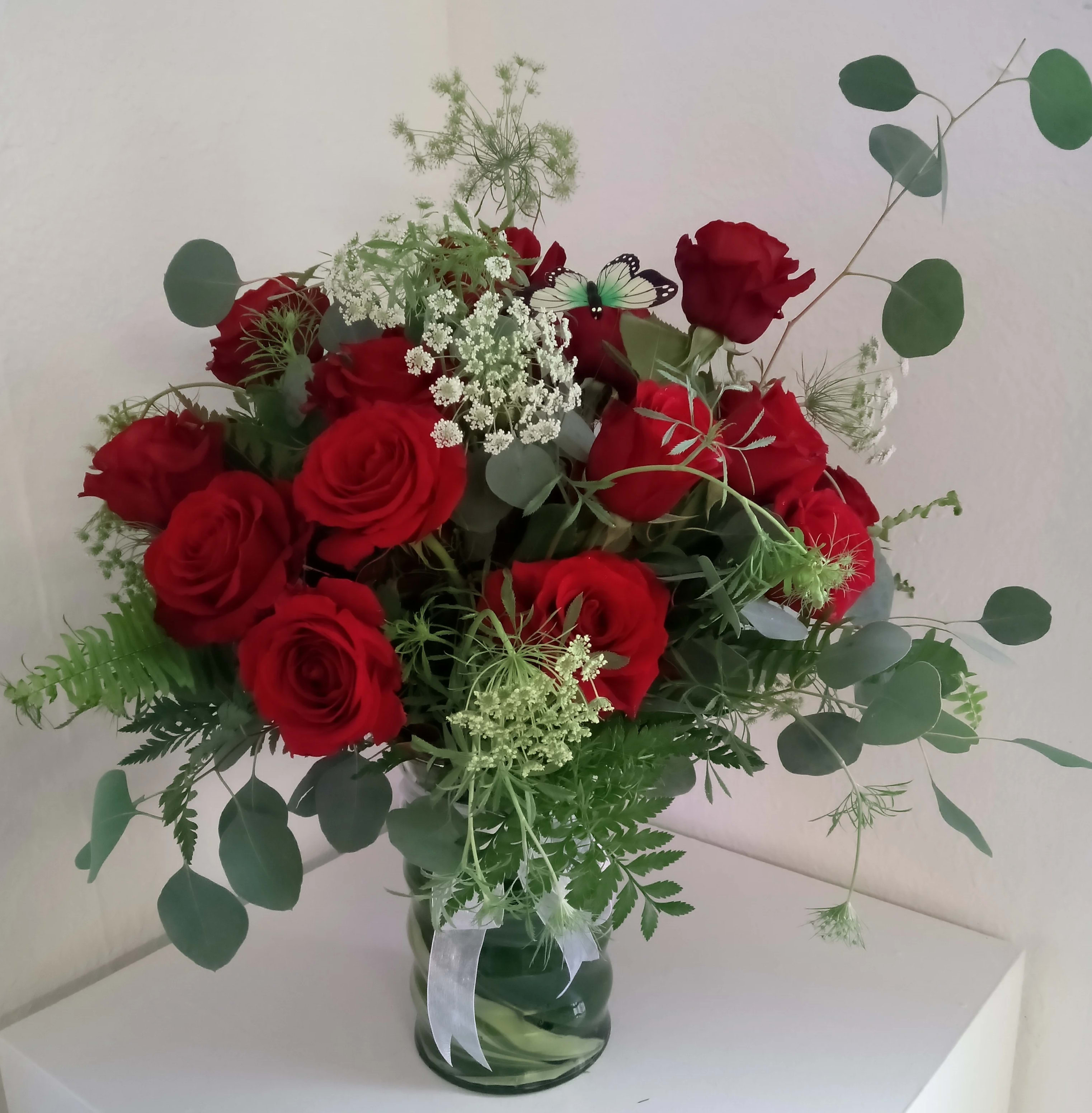 Two Dozen Red Roses (Upgrade for more) - Two dozen red roses arranged in a large clear glass vase. Very nice presentation for valentines day, anniversary, or just because!