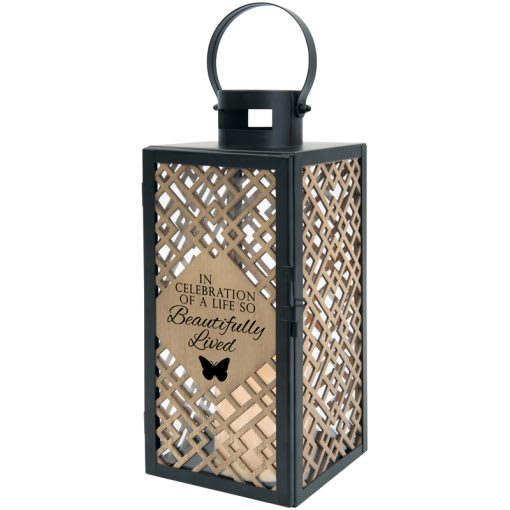 Decorative black lantern with a lattice panel and memorial message