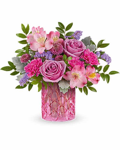 Teleflora's Pink Rhapsody Bouquet - Celebrate her in style with Teleflora's Pink Rhapsody Bouquet, a vibrant mix of pink and lavender blooms beautifully arranged in Teleflora's Pink Rhapsody Vase. This stunning arrangement adds bold color and lasting charm to any space.