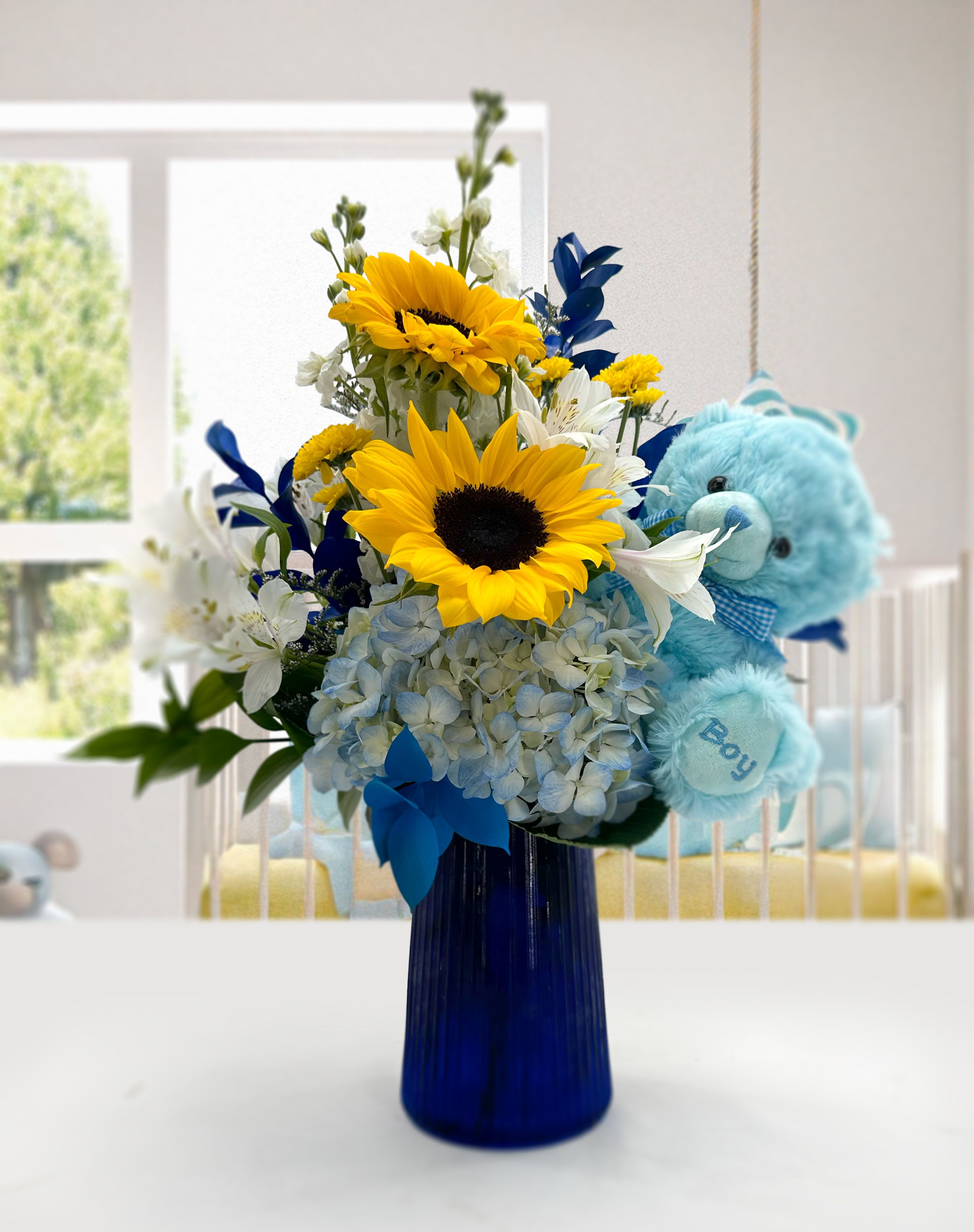 Bundle: Baby Boy! - Bouquet will arrive with a 9" blue plush teddy keepsake.