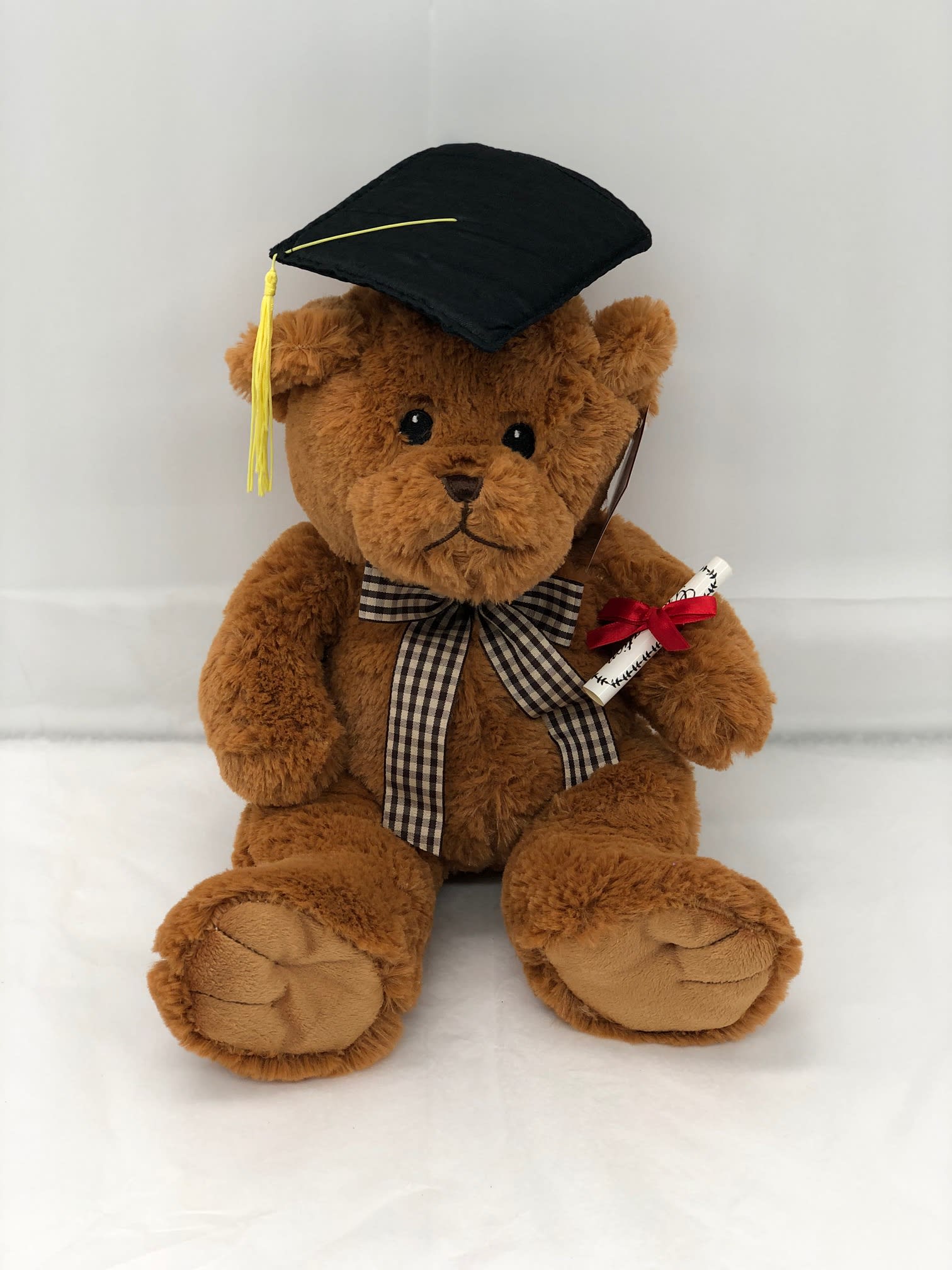 Graduation teddy bear with cap, ribbon, and diploma