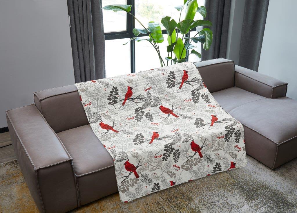 Cardinals Quilted Throw - Add a touch of natural beauty and comfort to your home with this Virah Bella Cardinal Quilted Throw. Featuring a stunning cardinal design, this quilted throw brings warmth, charm, and timeless style to any living room, bedroom, sunroom, or cozy reading corner. The vibrant cardinal artwork makes it a beautiful decorative accent while providing the comfort you need for everyday relaxation.  Measuring 50 inches by 60 inches, this generously sized throw is perfect for draping over a sofa, chair, or bed, and makes a thoughtful gift for bird lovers, nature enthusiasts, and anyone who appreciates elegant home décor. The soft quilted construction offers both durability and comfort, making it ideal for year-round use.  Local delivery is available throughout the greater Atlanta area, including Smyrna, Marietta, Mableton, Austell, Powder Springs, and Atlanta. Whether you're shopping for your own home or searching for a special gift, this beautiful cardinal quilted throw is a wonderful addition to any space.