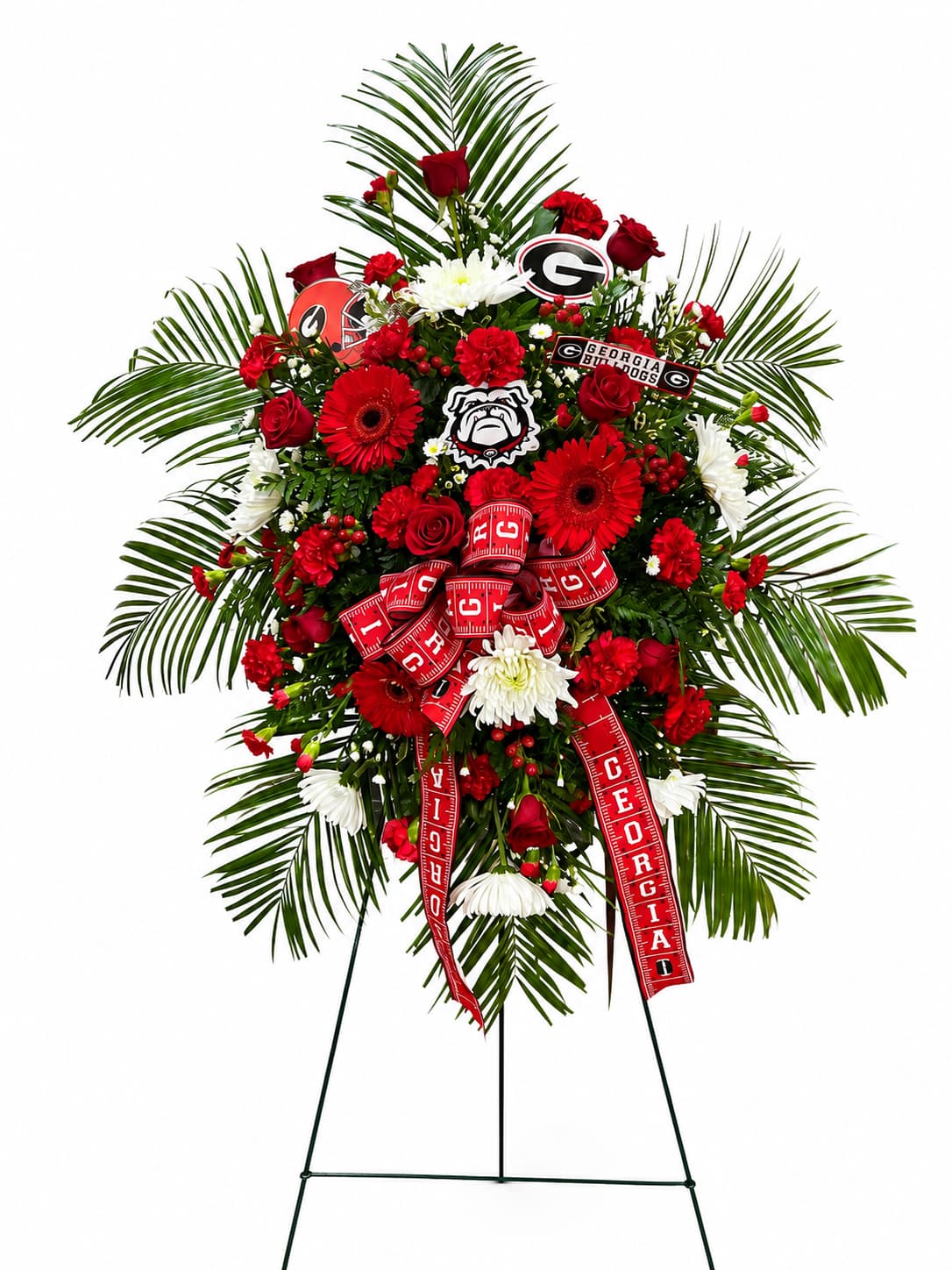 Red and white floral standing spray with Georgia Bulldogs ribbons and logos