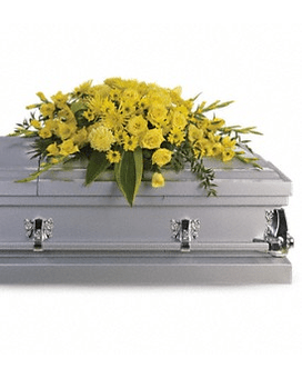 Yellow floral spray on a gray casket