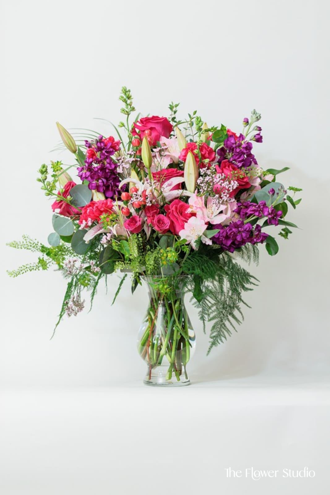 A Lots of Love  - A pink flower arrangement for a special person would typically feature a selection of flowers predominantly in shades of pink. The arrangement may be designed to evoke feelings of warmth, affection, and admiration, making it particularly suitable for expressing love, gratitude, or appreciation.  *Picture Shown as Deluxe*  Our artists hand-design each arrangement, so Flowers &amp; Containers colors and style may vary due to local availability therefore we are unable to fulfill any requests for specific florals, colors, or containers/vessels.