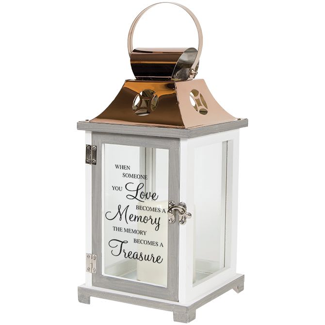 Decorative lantern with a memorial quote on the glass panels