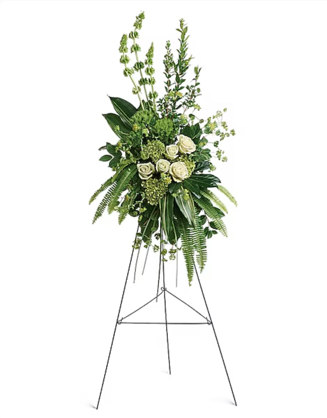 Tall white rose and greenery standing spray on an easel