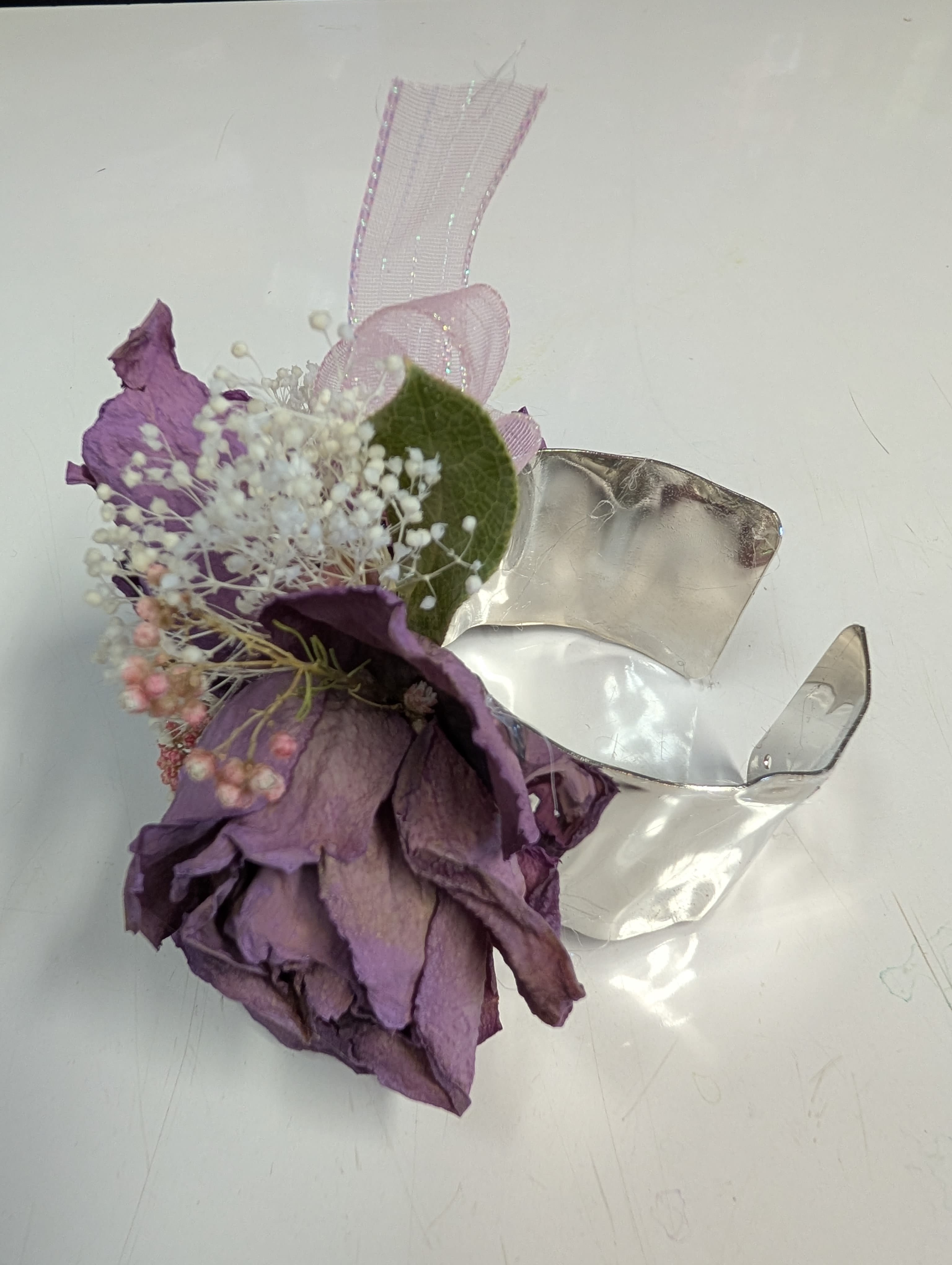 Lavender dried rose silver cuff corsage  - A forever keepsake. This silver bracelet is dressed up with dried roses and baby's breath. 