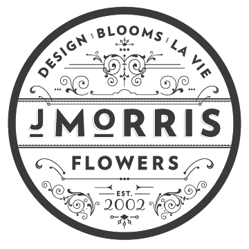 Circular logo reading J Morris Flowers with decorative flourishes