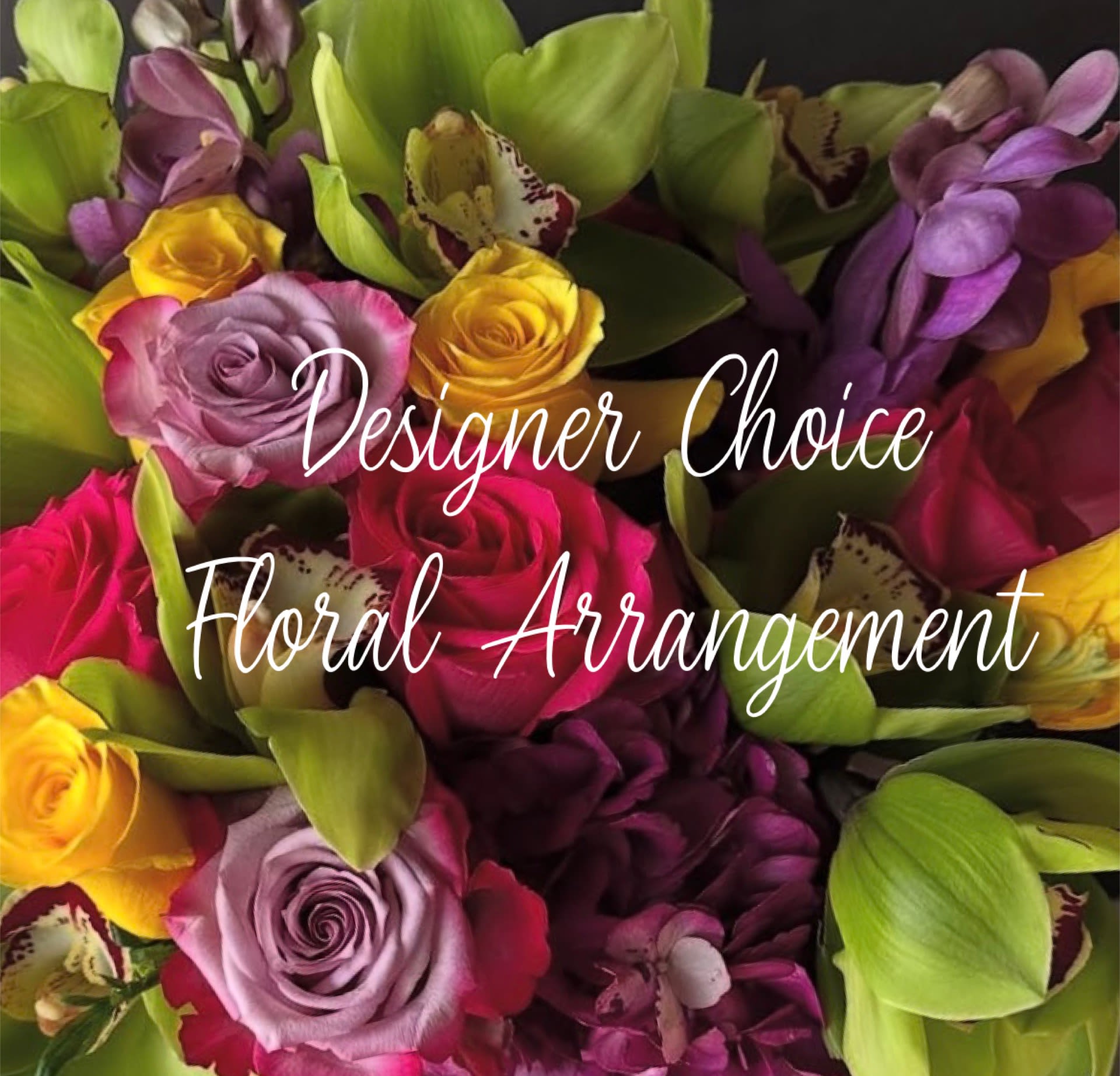 Mixed bouquet of roses and orchids in bright pink, yellow, purple, and green