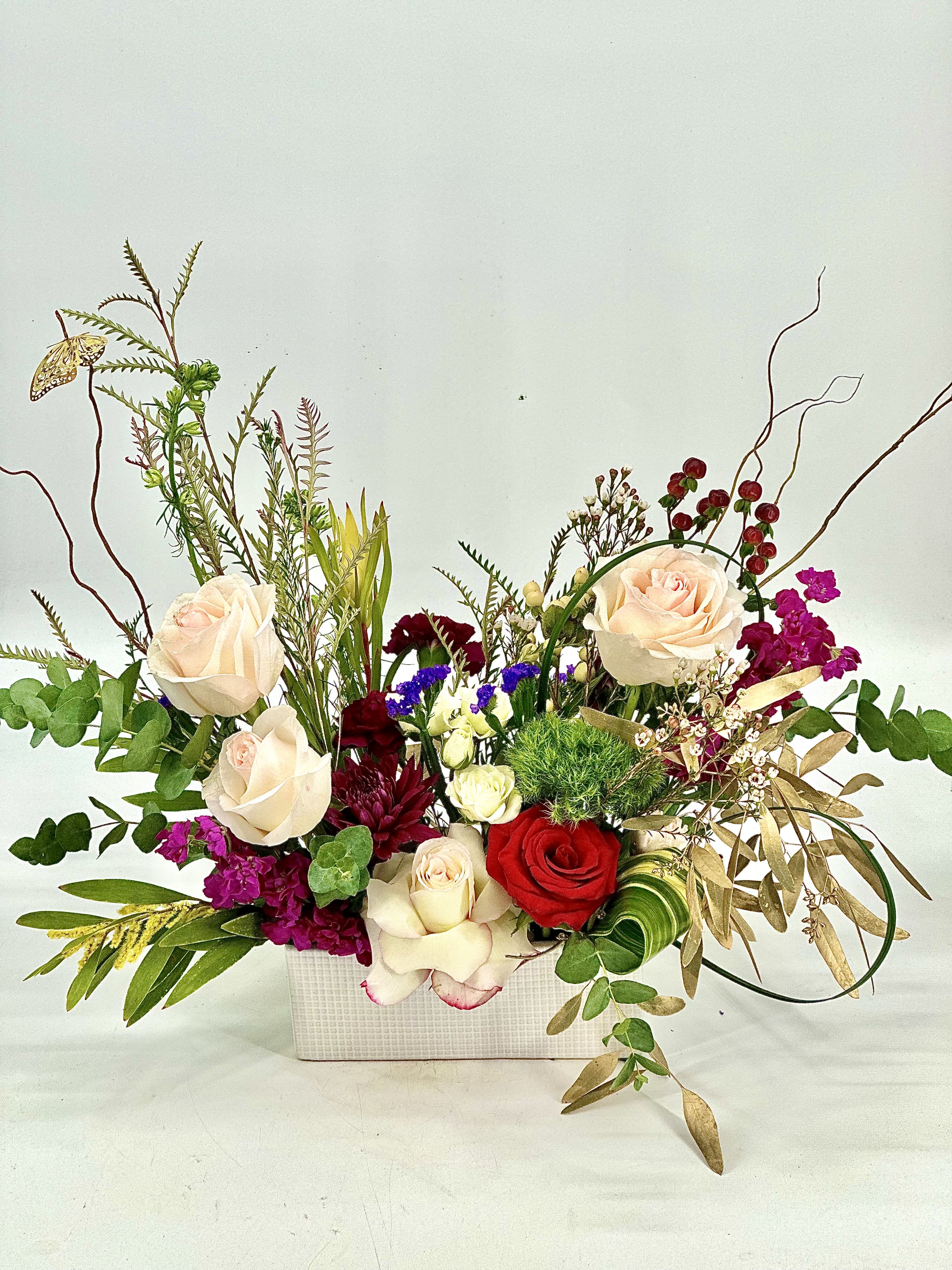 Asymmetrical ,modern   Design - Sen this colorful ,asymmetrical ,arrangement and  let them be touched with nature's beauty !So much painterly , botanical details in this arrangement  for anyone to be enjoy and smile !